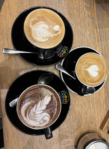 Three coffee drinks at TABAQ Coffee in Dhaka